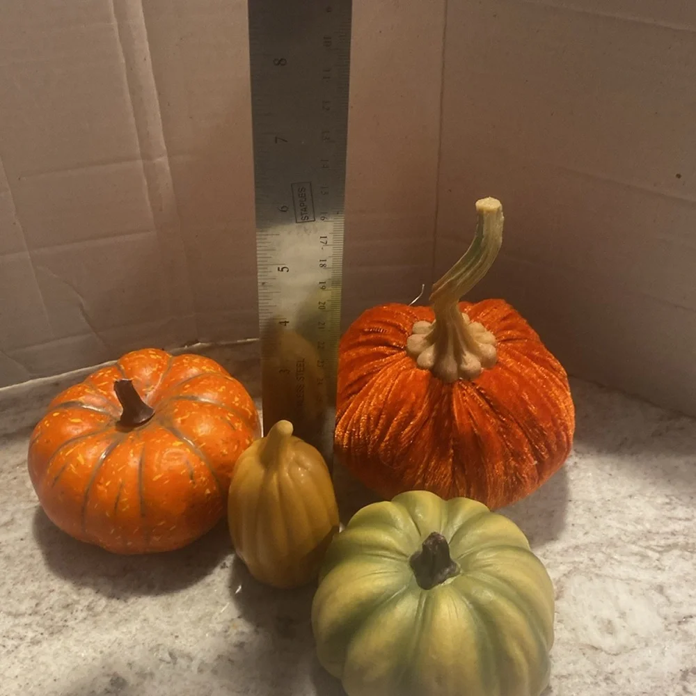 Set of 4 festive pumpkins. Great for fall decorating. Various sizes & materials.